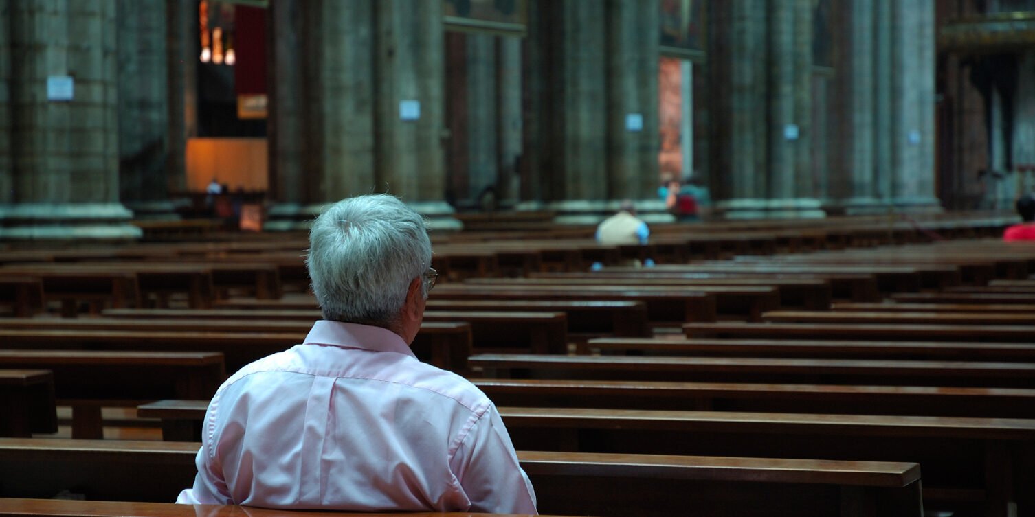 man-in-church-alone